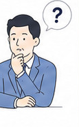 資料を読み比べて判断に迷っている社員